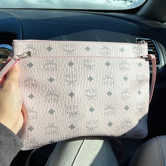 A pink crossbody mcm bag. It’s a newly bag not even a week old